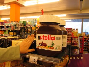 An ENORMOUS bottle of Nutella!  Sara put her hand next to it for size comparison!  And it was not a promo size...people really buy it this size!!!