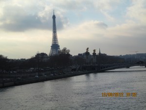 Eiffel Tower from a bridge crossing The Siene