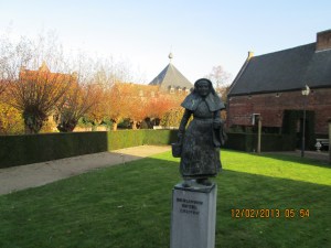 Beguine Woman Statue