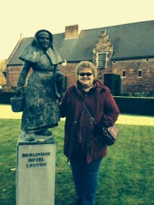 Lila with Beguine statue